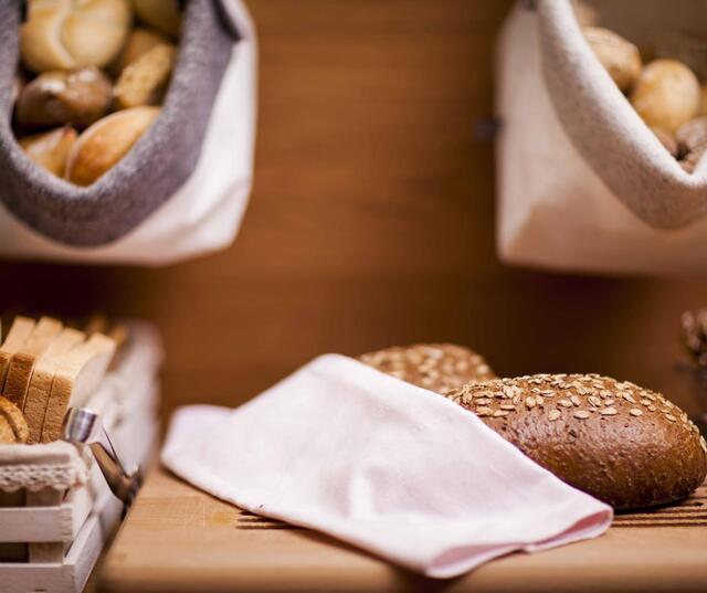 Various types of bread at the breakfast buffet.